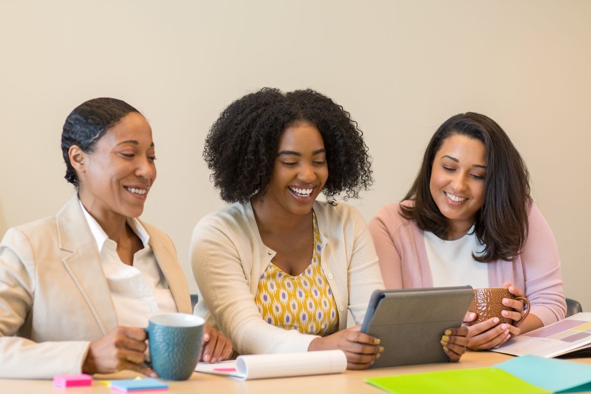 Diverse group of women at work in a meeting.